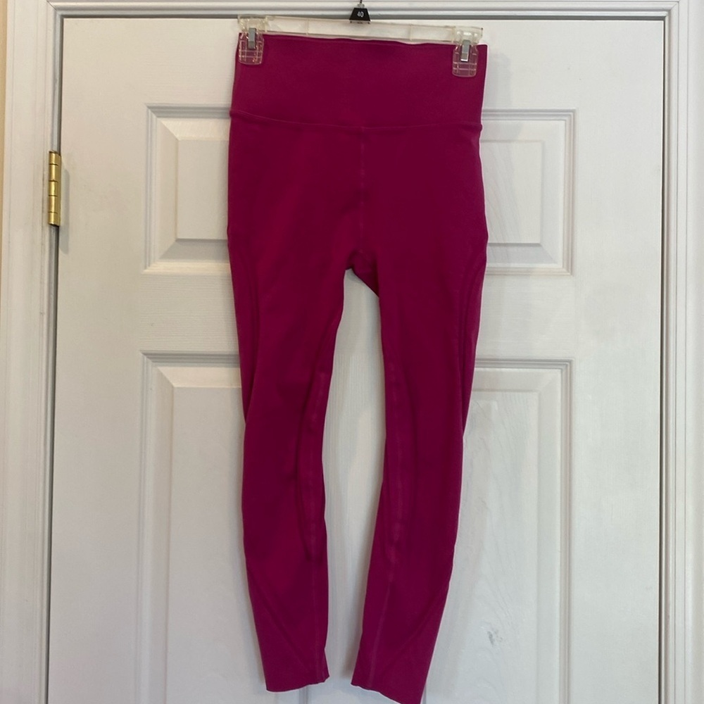 Sculptknit leggings by Fabletics in pretty fuschia